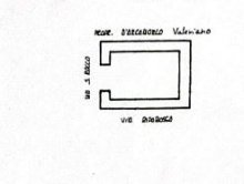 Portion of building on the first floor with garage